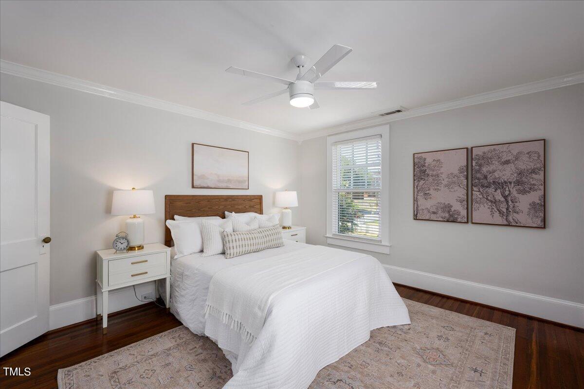 600 Harding Street Raleigh, NC 27604 - Photo 24 of 33 a bedroom with a large bed and a window