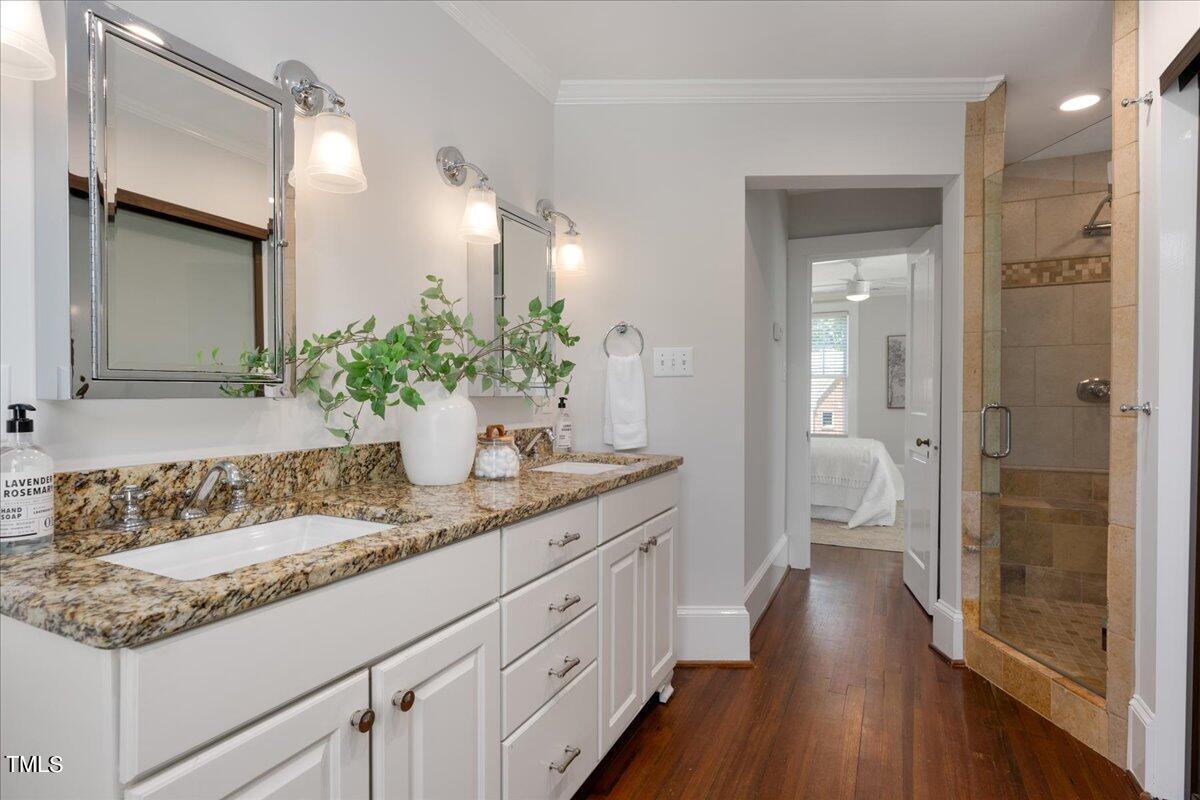 600 Harding Street Raleigh, NC 27604 - Photo 26 of 33 a bathroom with a sink and a mirror