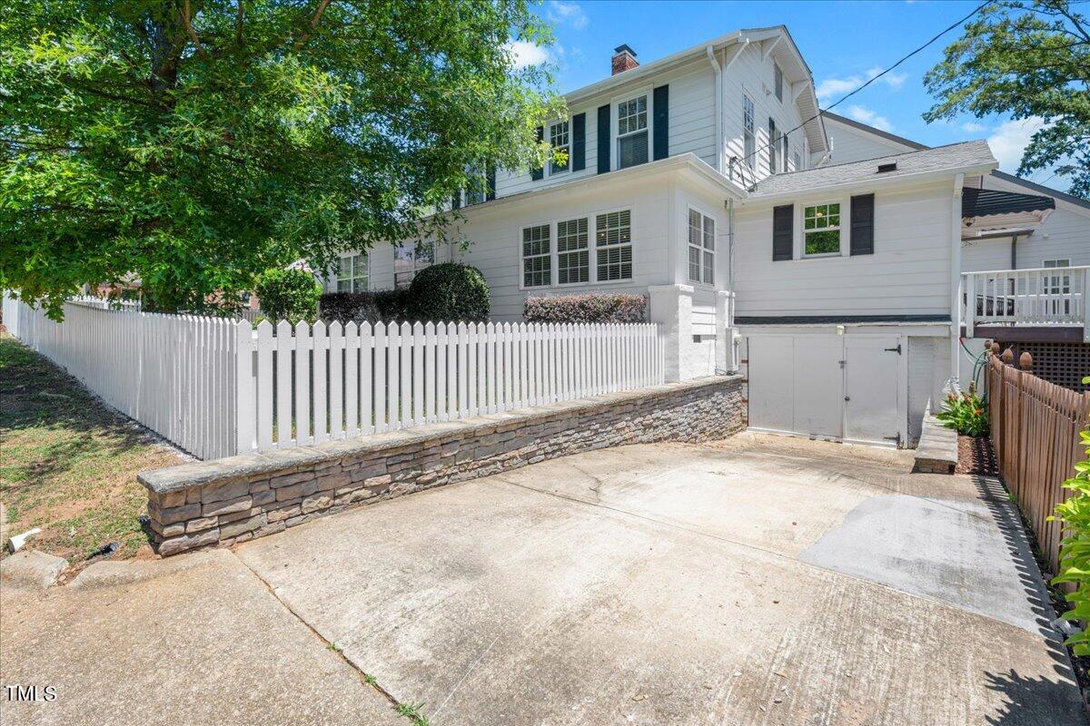 600 Harding Street Raleigh, NC 27604 - Photo 33 of 33 a view of a house with a small yard and wooden fence