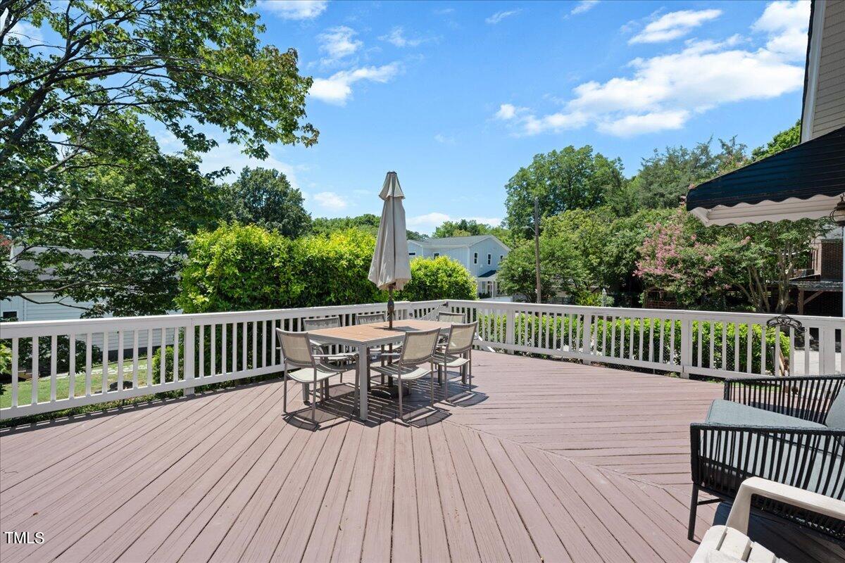 600 Harding Street Raleigh, NC 27604 - Photo 4 of 33 a view of balcony with furniture and wooden floor