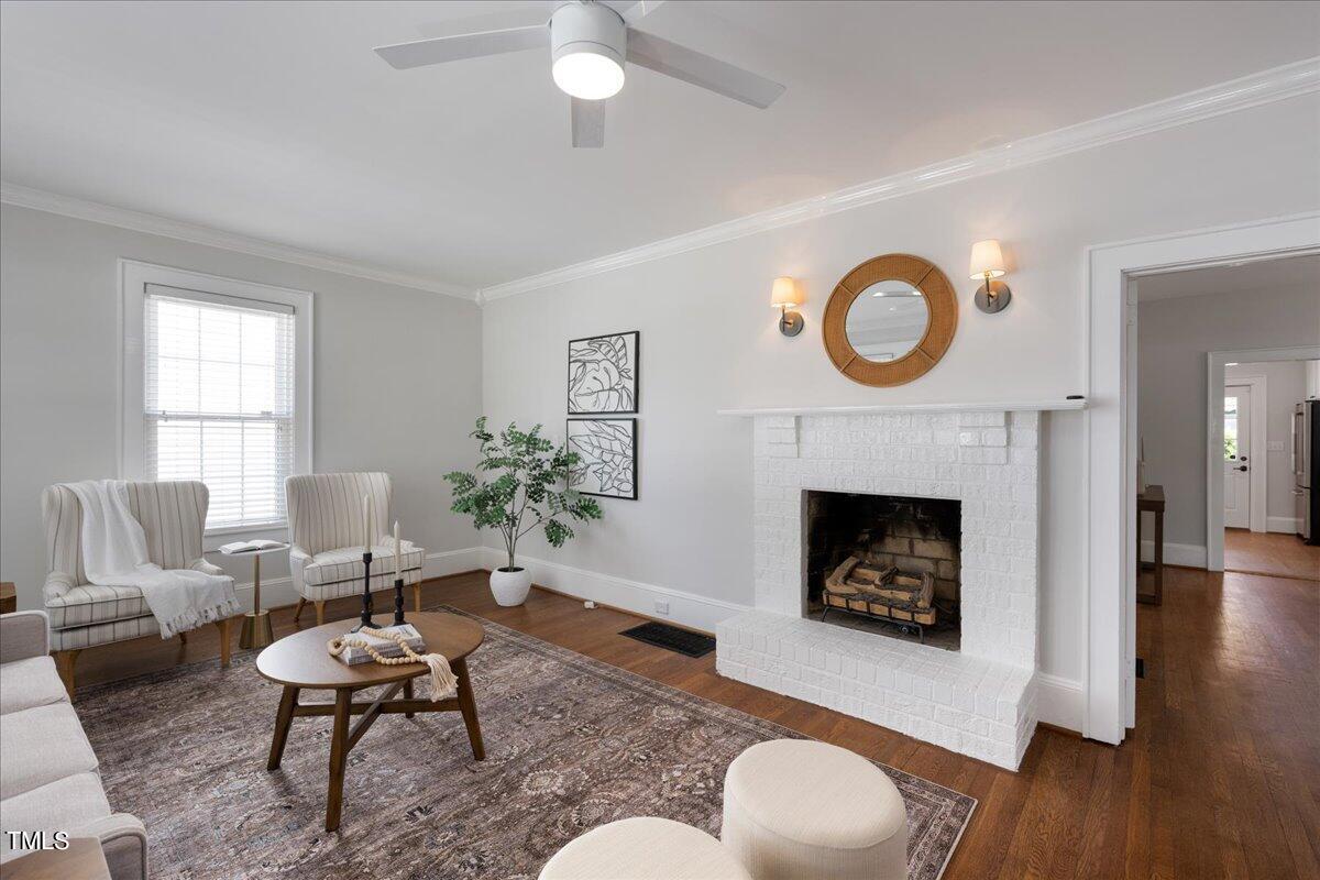 600 Harding Street Raleigh, NC 27604 - Photo 5 of 33 a living room with furniture and a fireplace