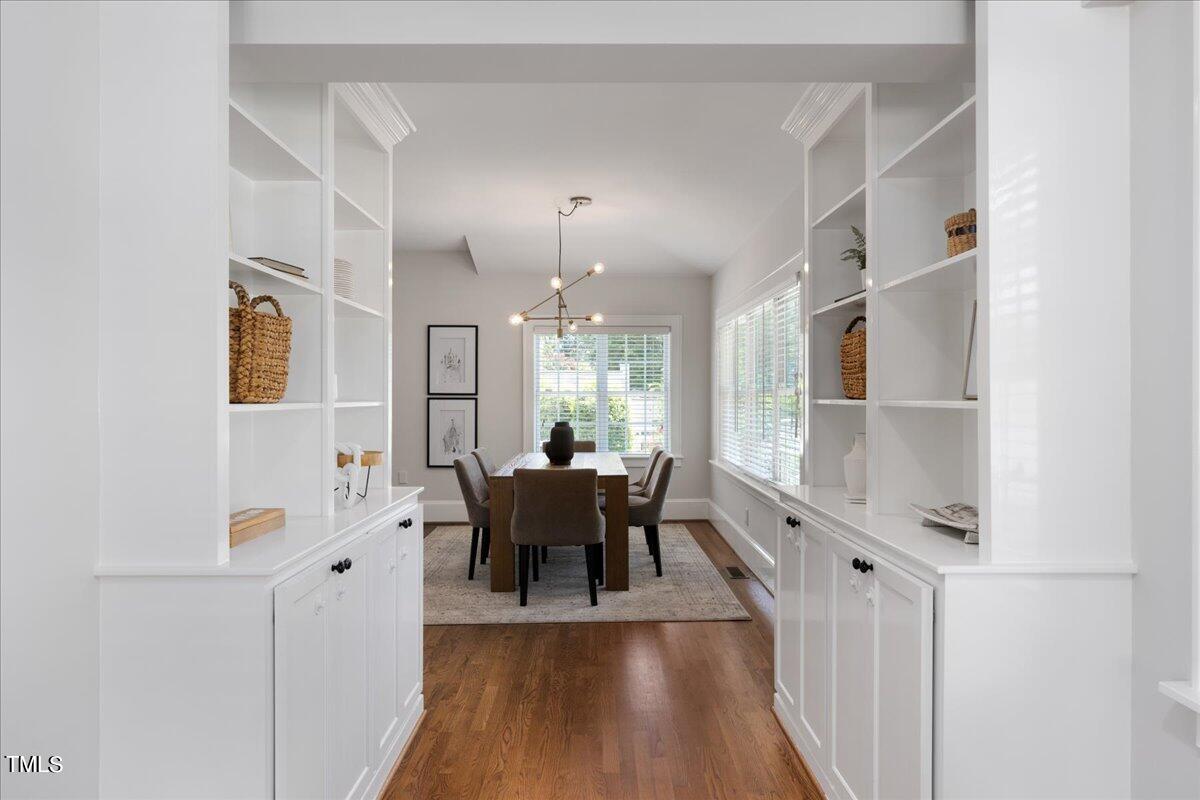 600 Harding Street Raleigh, NC 27604 - Photo 10 of 33 a view of a dining room with furniture window and wooden floor