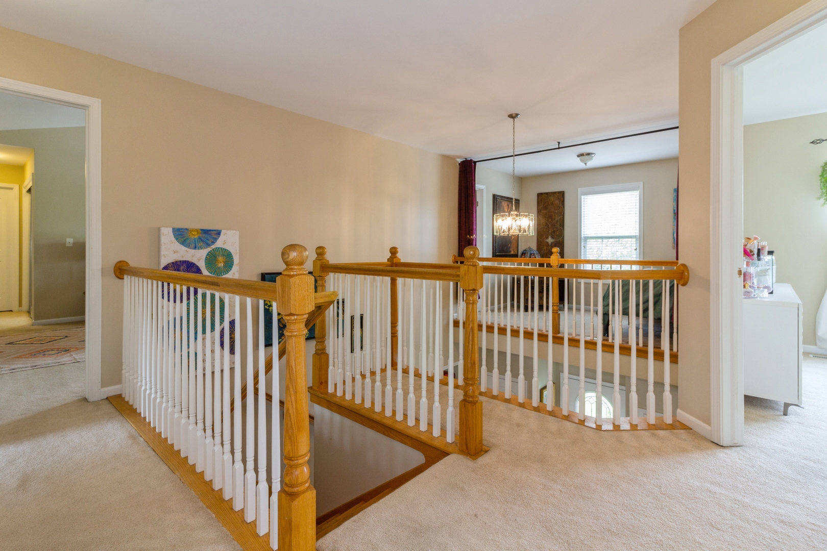 705 Queens Gate Circle Sugar Grove, IL 60554 - Photo 14 of 25 a view of a hallway view with staircase