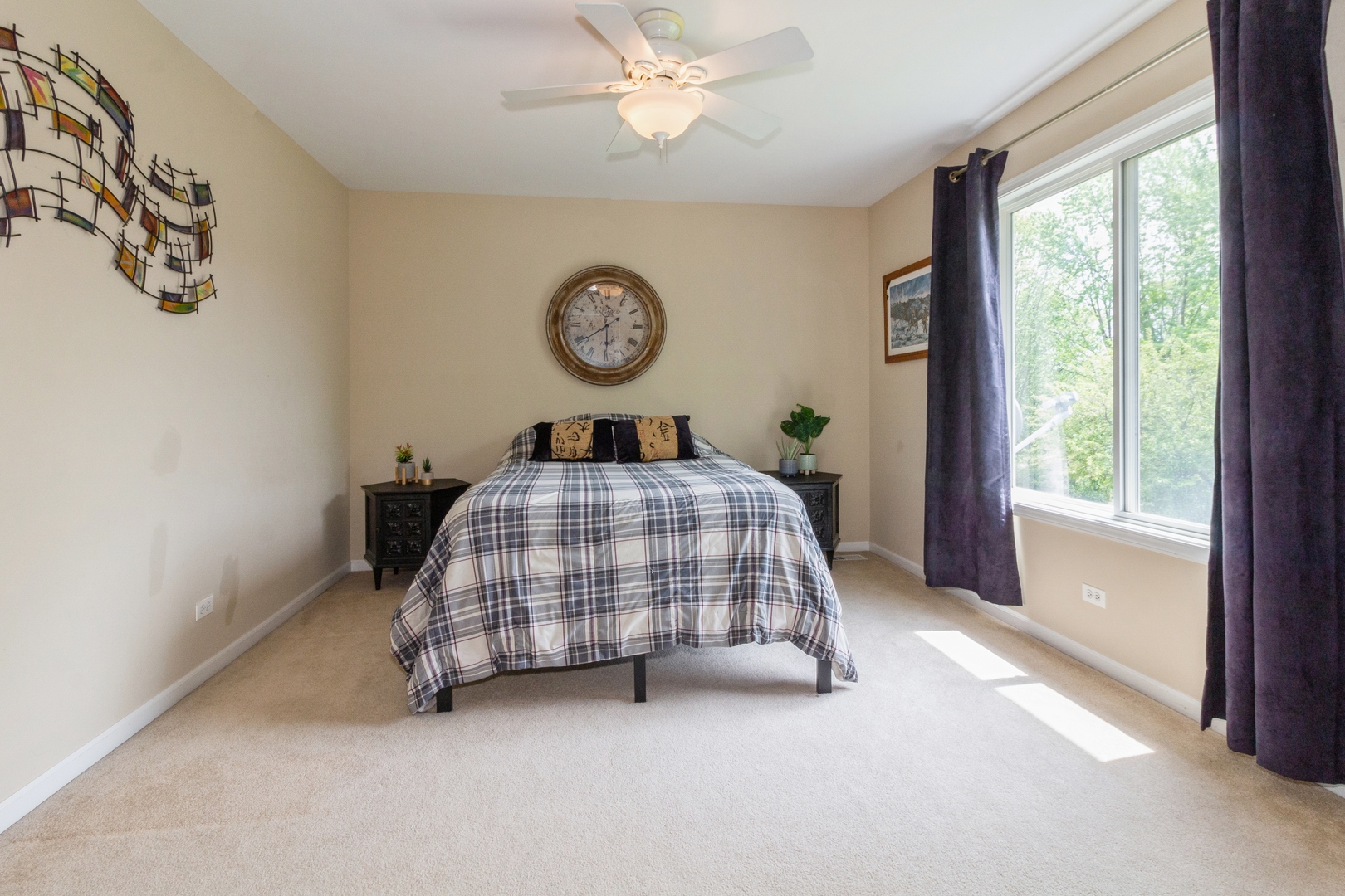 705 Queens Gate Circle Sugar Grove, IL 60554 - Photo 18 of 25 a bedroom with a bed and window