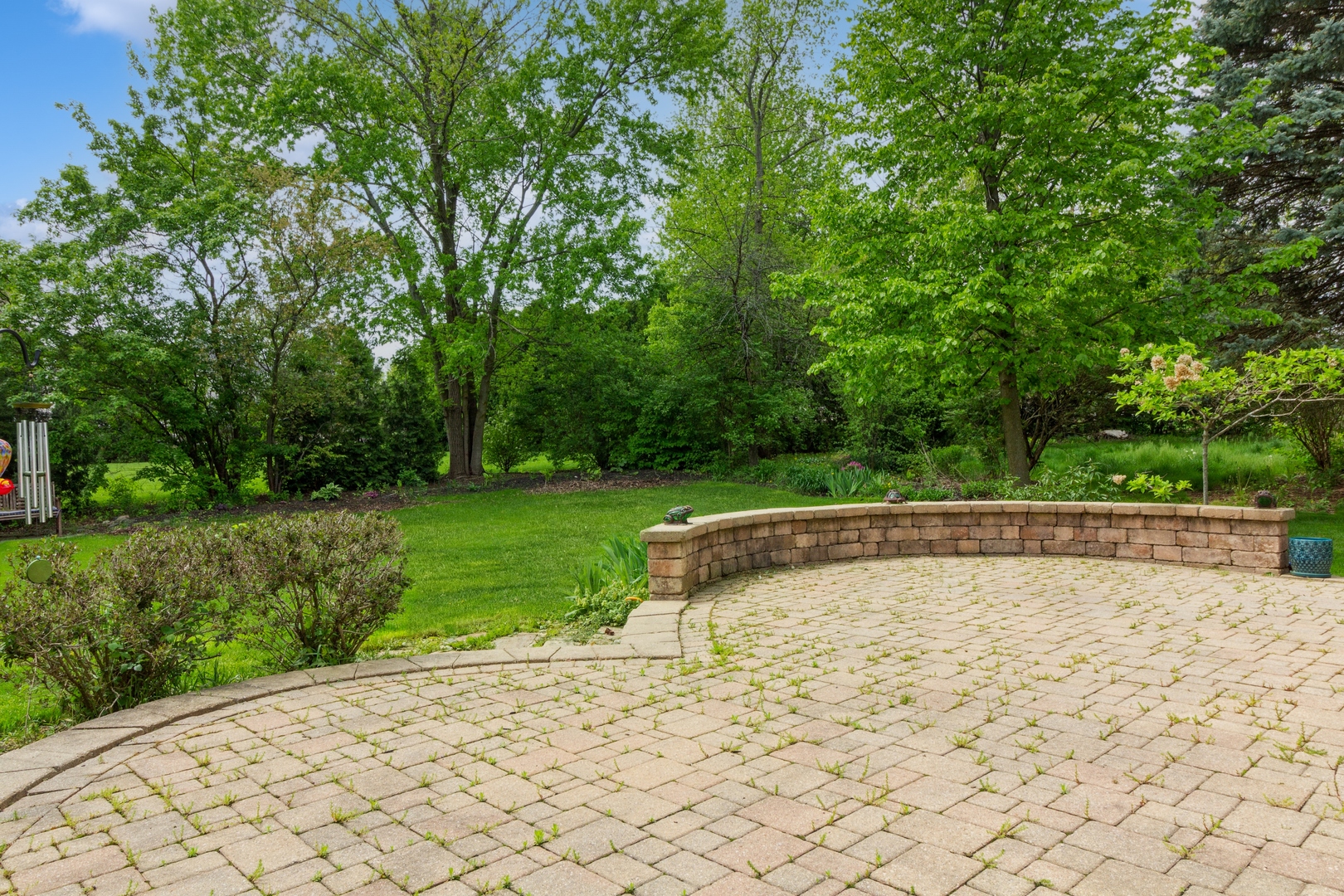 705 Queens Gate Circle Sugar Grove, IL 60554 - Photo 2 of 25 a view of a swimming pool and a yard