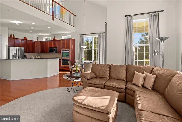 a bedroom with a bed and a chair