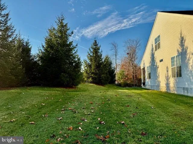 a view of an chairs and table in the balcony