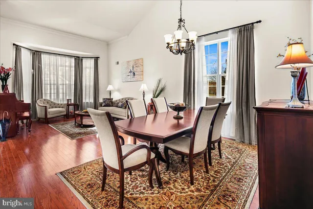 a kitchen with granite countertop stainless steel appliances and wooden cabinets