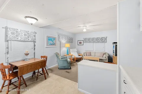 a bedroom with a bed and a chair