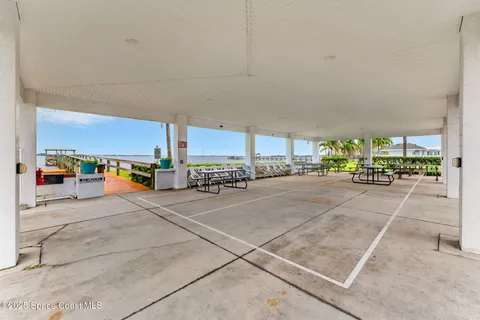 a view of a balcony with wooden floor