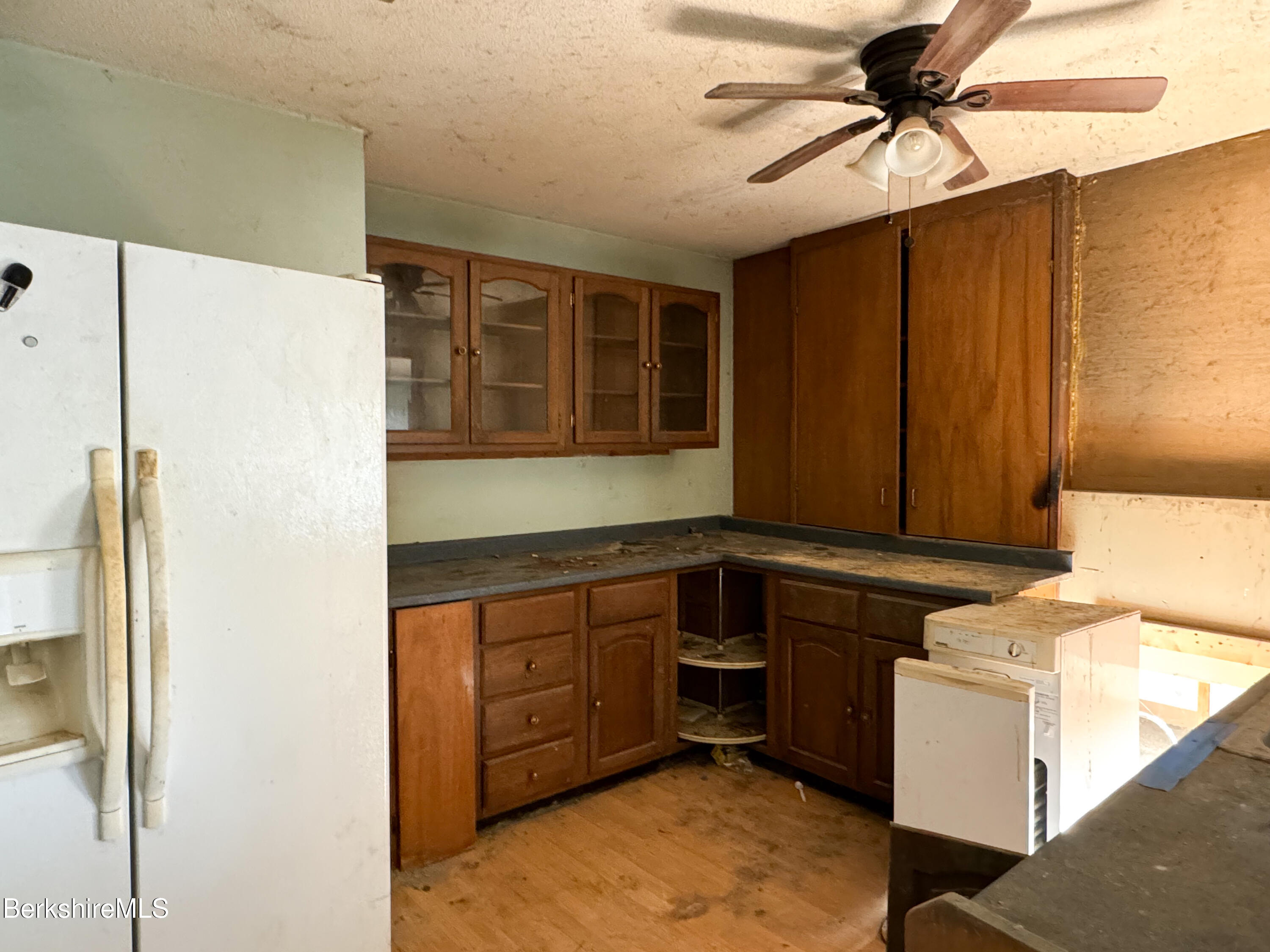 223 Elm Street Holyoke, MA 01040 - Photo 13 of 30 a kitchen with a refrigerator and a sink