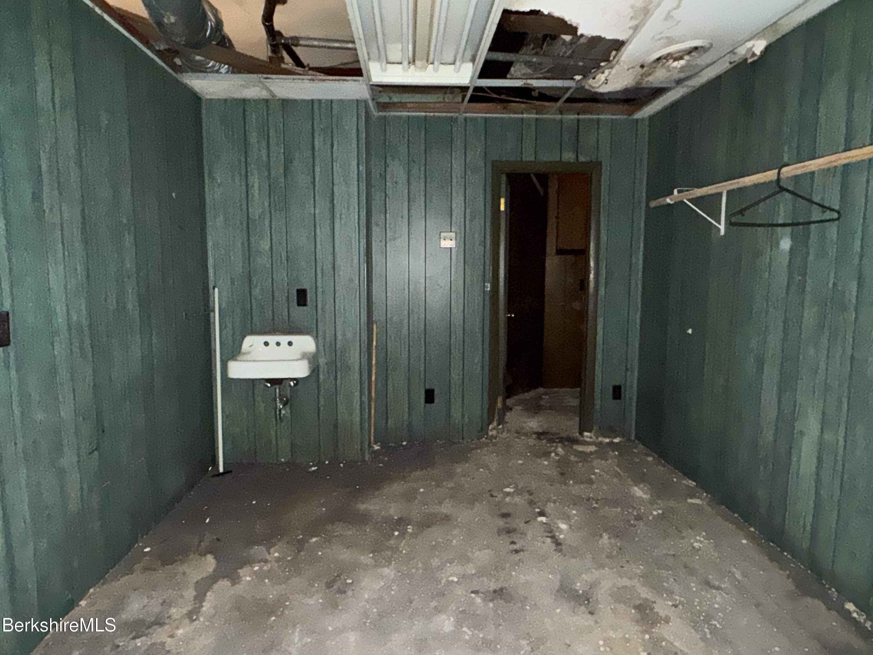 223 Elm Street Holyoke, MA 01040 - Photo 16 of 30 a view of a bathroom with a sink and a shower