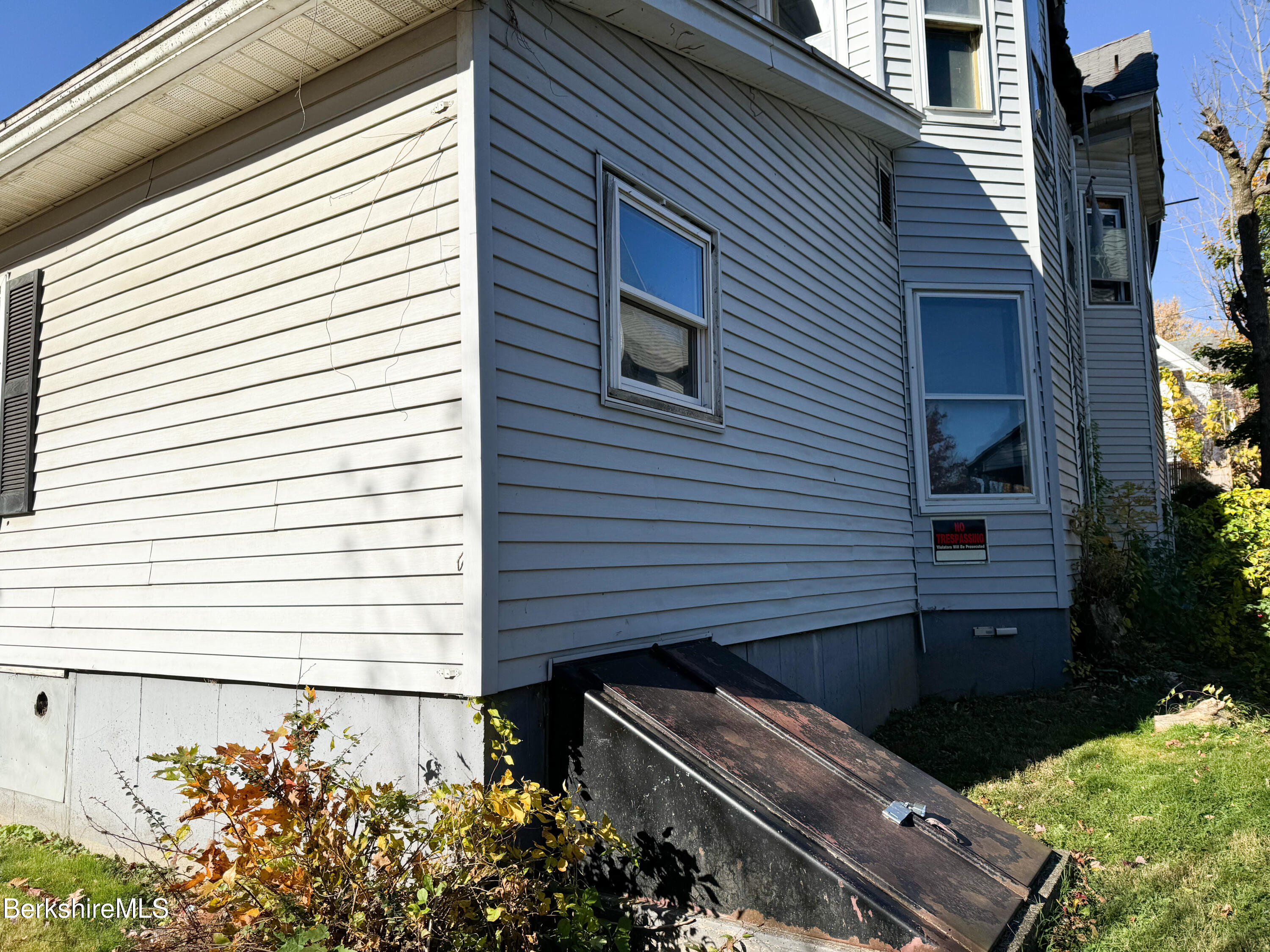 223 Elm Street Holyoke, MA 01040 - Photo 5 of 30 a view of a house with a yard and a garden