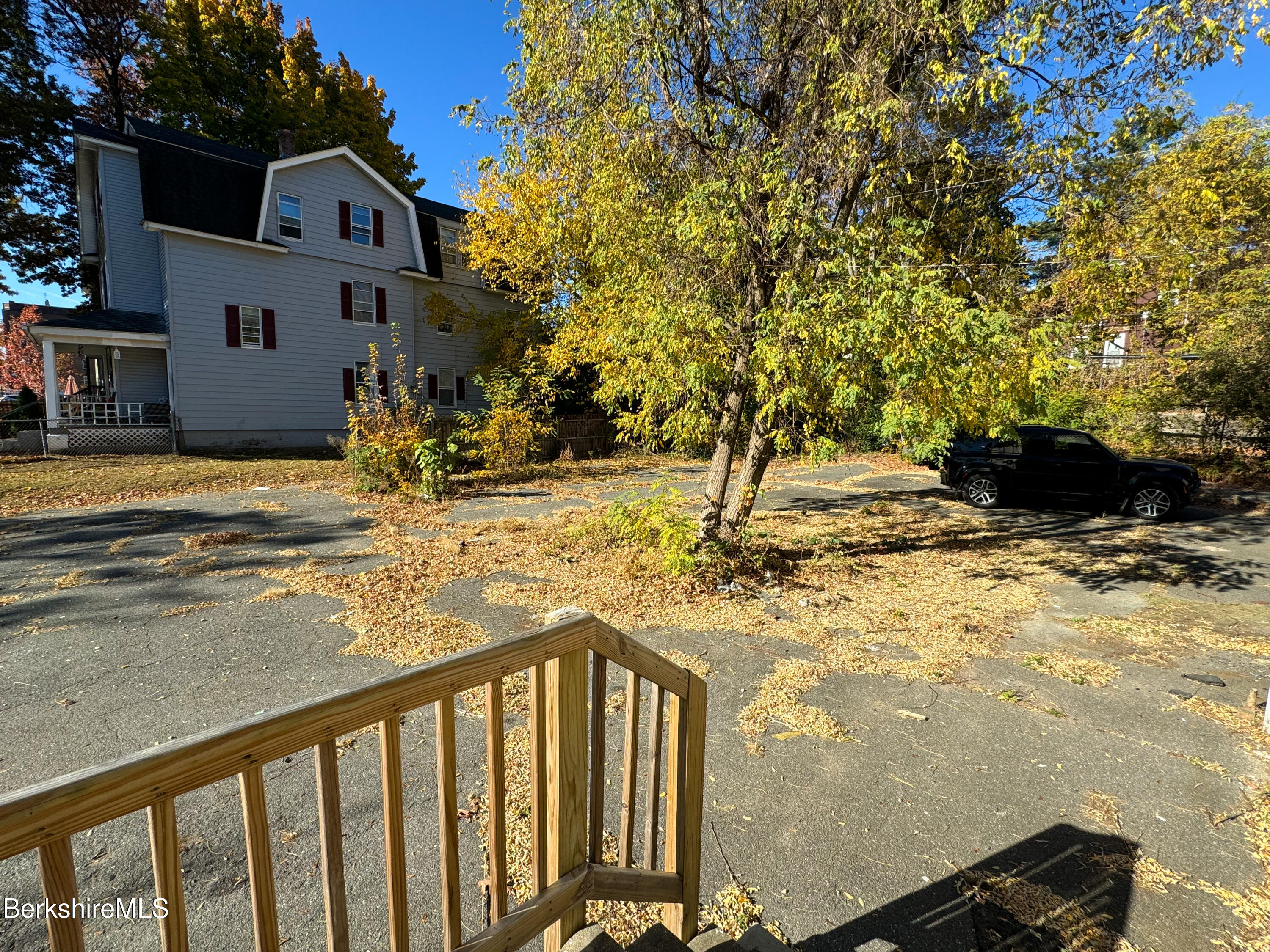 223 Elm Street Holyoke, MA 01040 - Photo 6 of 30 a view of a house with a yard