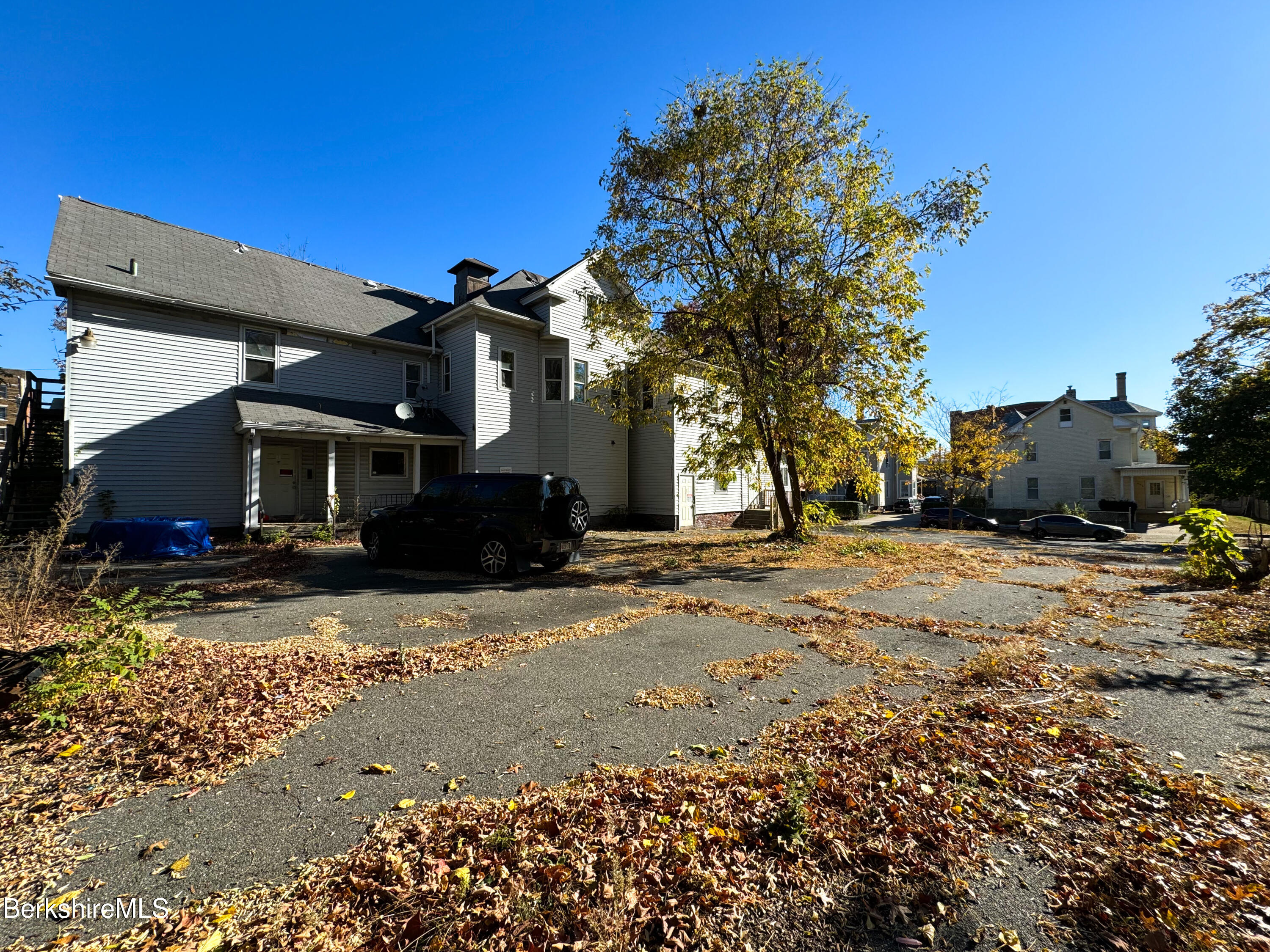 223 Elm Street Holyoke, MA 01040 - Photo 8 of 30 a front view of a house with a yard