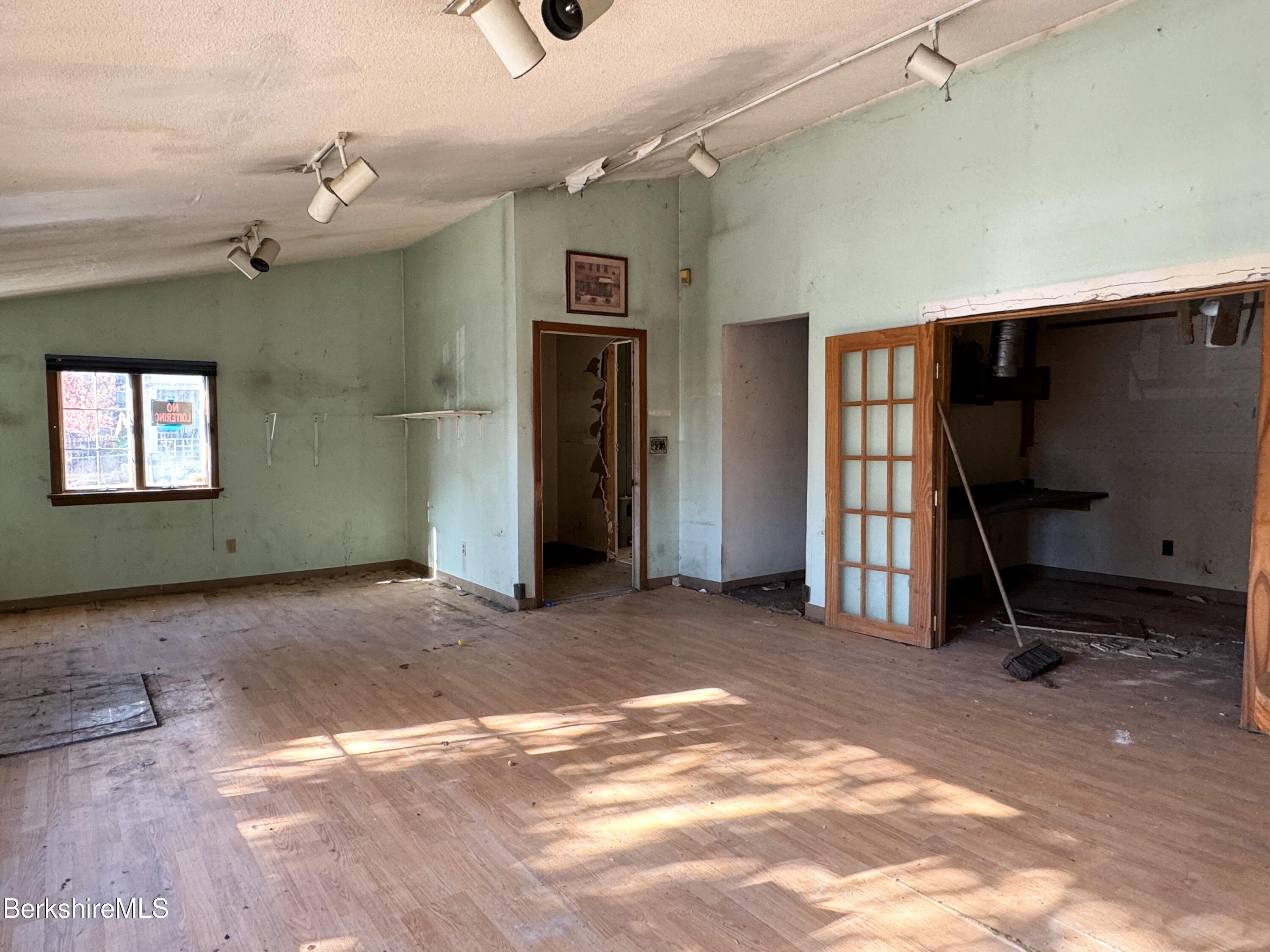223 Elm Street Holyoke, MA 01040 - Photo 10 of 30 a view of a livingroom with a staircase