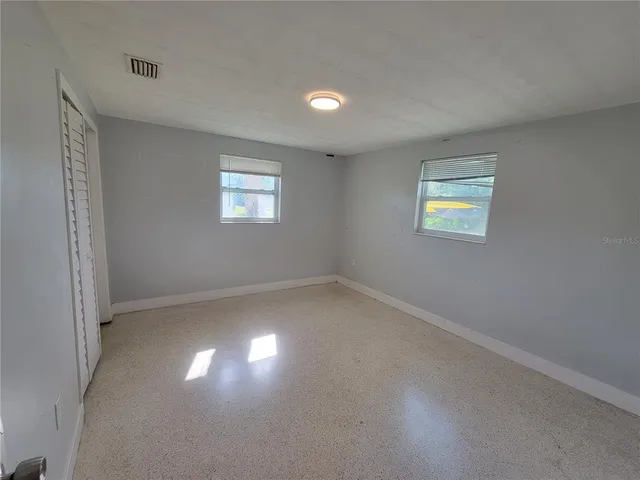 an empty room with a window