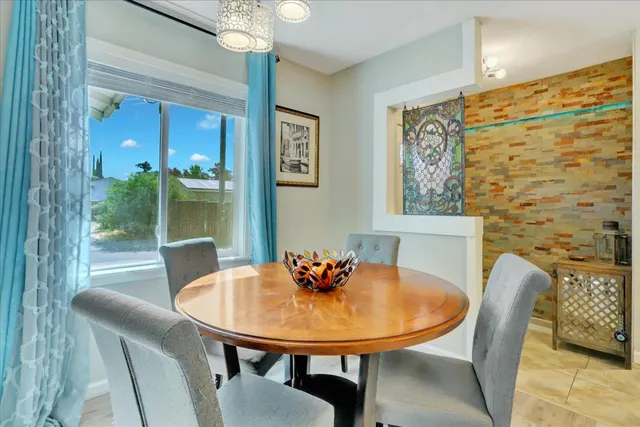 a view of a kitchen with a sink and dishwasher