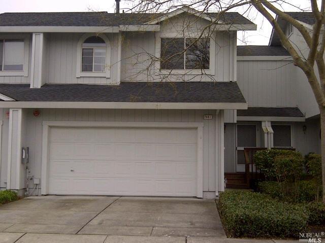 7441 Mountain Place Rohnert Park, CA 94928 - Photo 1 of 1 a front view of a house with garage