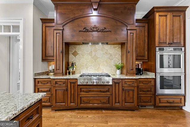 a en suite bathroom with double sink and a mirror