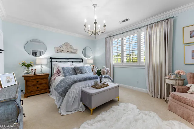 a living room with lots of furniture and white walls