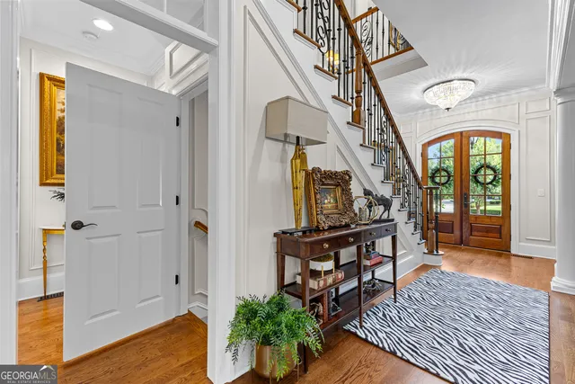 a view of a deck with chair and wooden floor