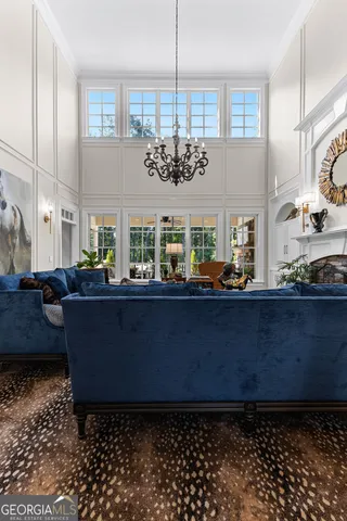 a large kitchen with stainless steel appliances granite countertop a sink and dishwasher a stove with wooden floor