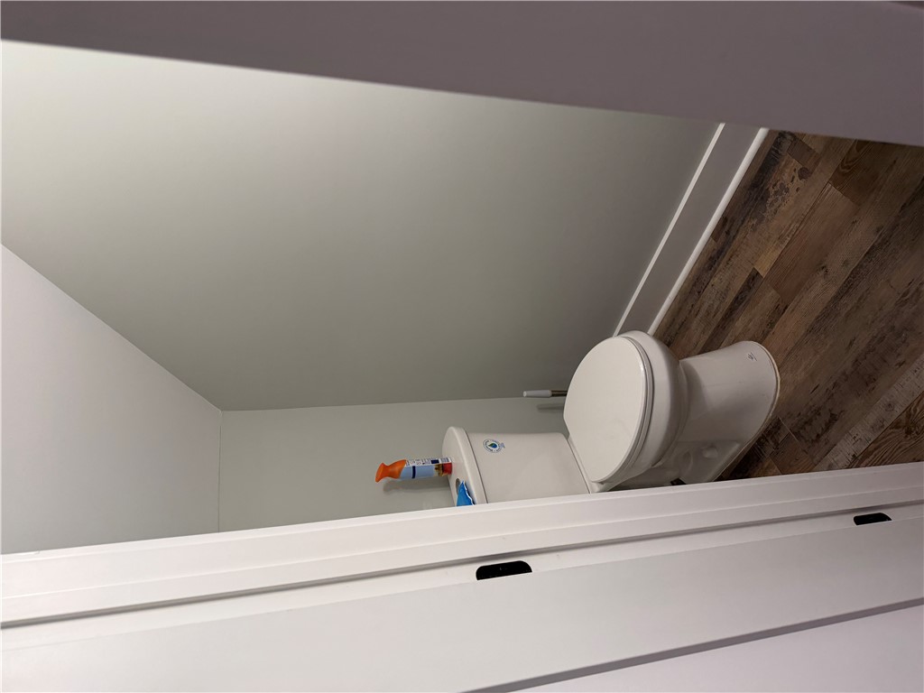 102 Turkey Trot Road Williamston, SC 29697 - Photo 11 of 37 This bathroom features durable flooring and a standard toilet.