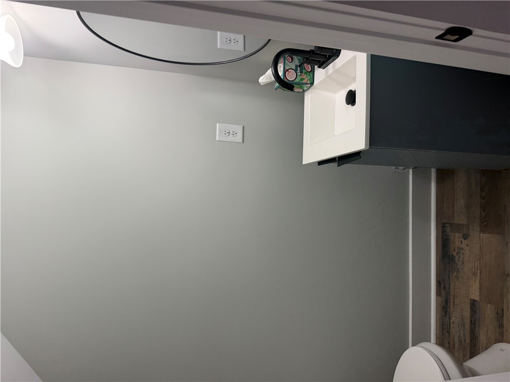 102 Turkey Trot Road Williamston, SC 29697 - Photo 12 of 37 This bathroom features a contemporary vanity and stylish wood-look flooring.