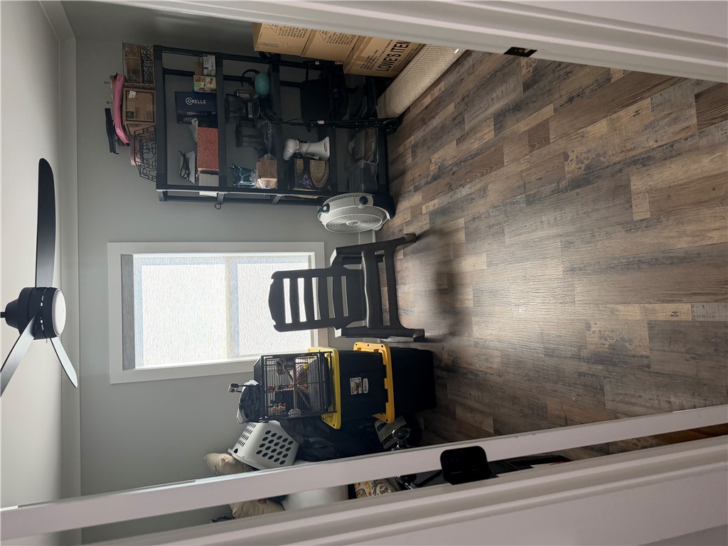 102 Turkey Trot Road Williamston, SC 29697 - Photo 27 of 37 This versatile space offers potential for various uses, featuring durable flooring and natural light.