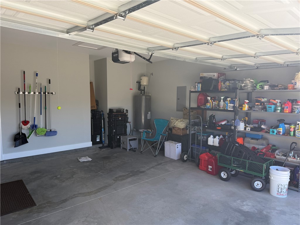 102 Turkey Trot Road Williamston, SC 29697 - Photo 30 of 37 This spacious garage offers ample storage and direct access, perfect for convenience and organization.