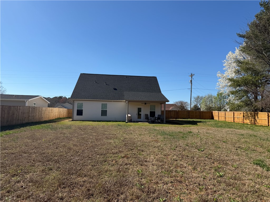 102 Turkey Trot Road Williamston, SC 29697 - Photo 36 of 37 This spacious backyard offers privacy and room for outdoor enjoyment.