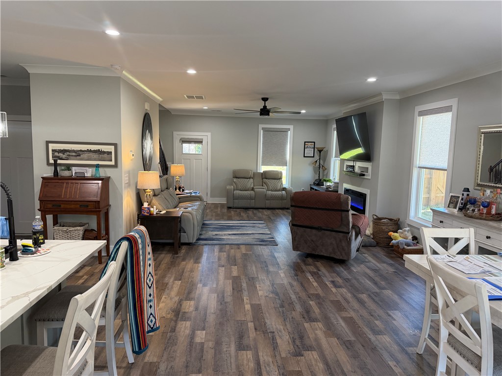 102 Turkey Trot Road Williamston, SC 29697 - Photo 7 of 37 This inviting space features durable flooring and abundant natural light, creating an ideal setting for gatherings.