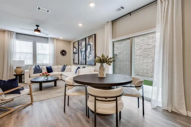 a kitchen that has a lot of cabinets a sink and a stove in it