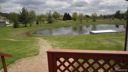725 Mayer Road St. Clair, MI 48079 - Photo 21 of 22 Back deck and pond.JPG