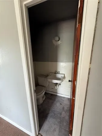 a view of utility room and empty room