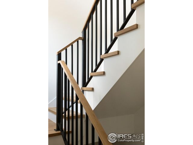 a view of a hallway with staircase