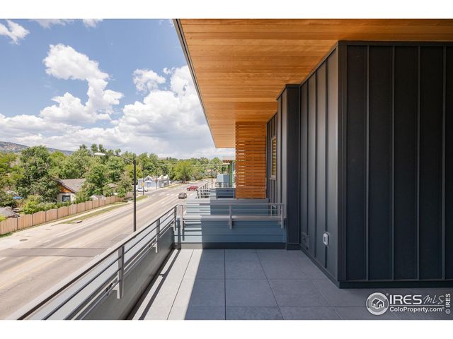 a view of a building with a street