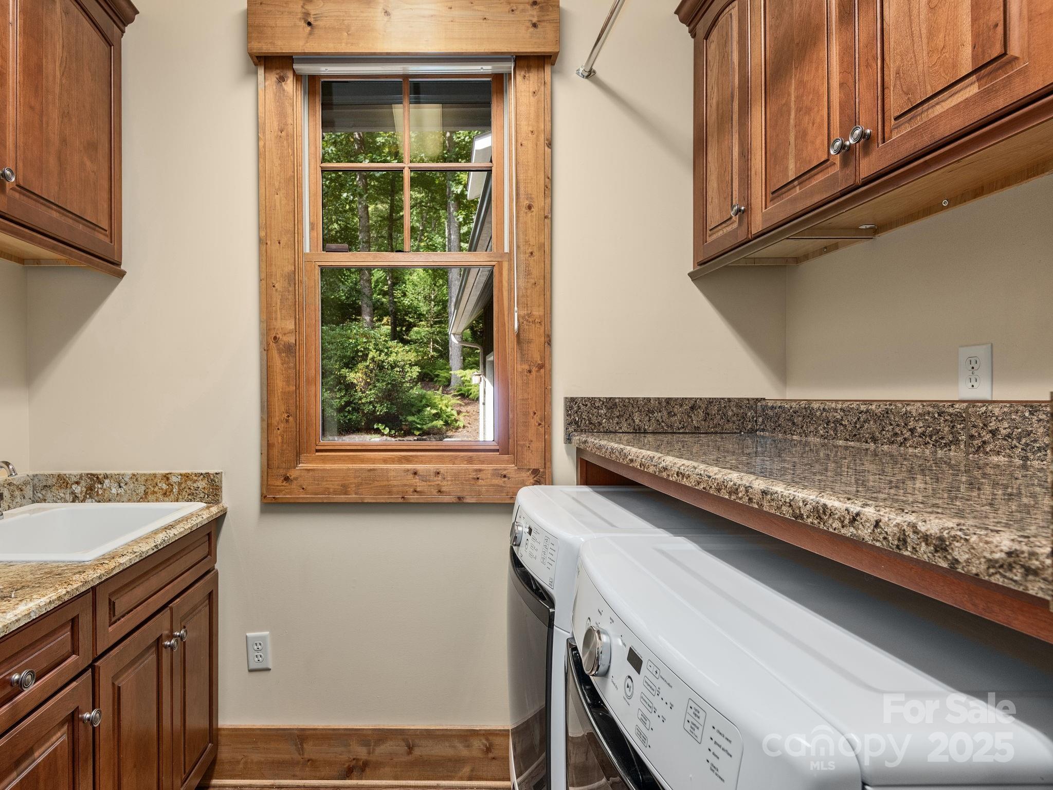 120 Mossy Rock Road Sapphire, NC 28774 - Photo 42 of 47 a view of a kitchen with a sink and a window