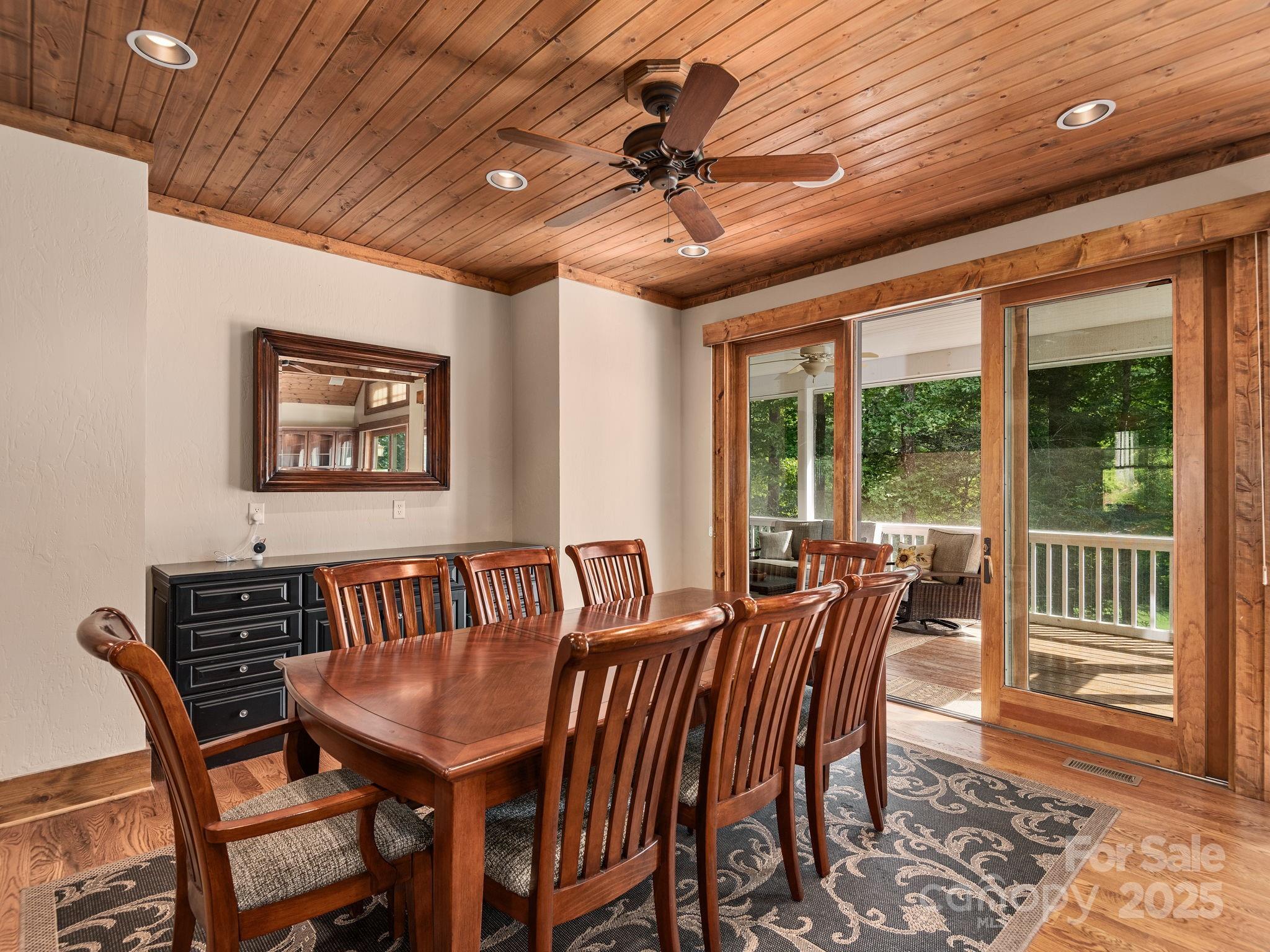 120 Mossy Rock Road Sapphire, NC 28774 - Photo 8 of 47 a view of a dining room with furniture window and outside view
