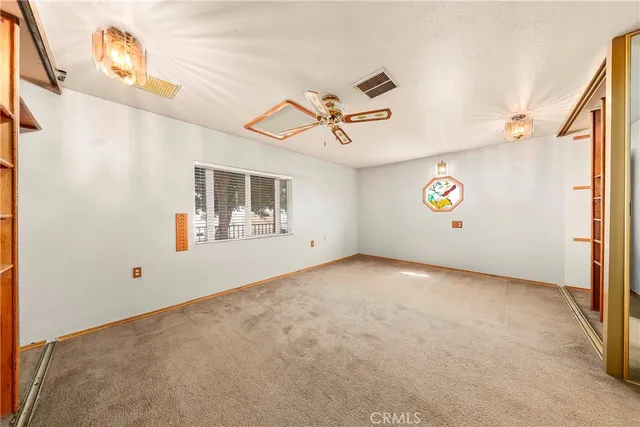 a view of swimming pool with a couch