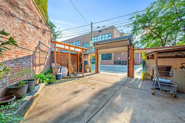 a view of a chair and tables in the patio
