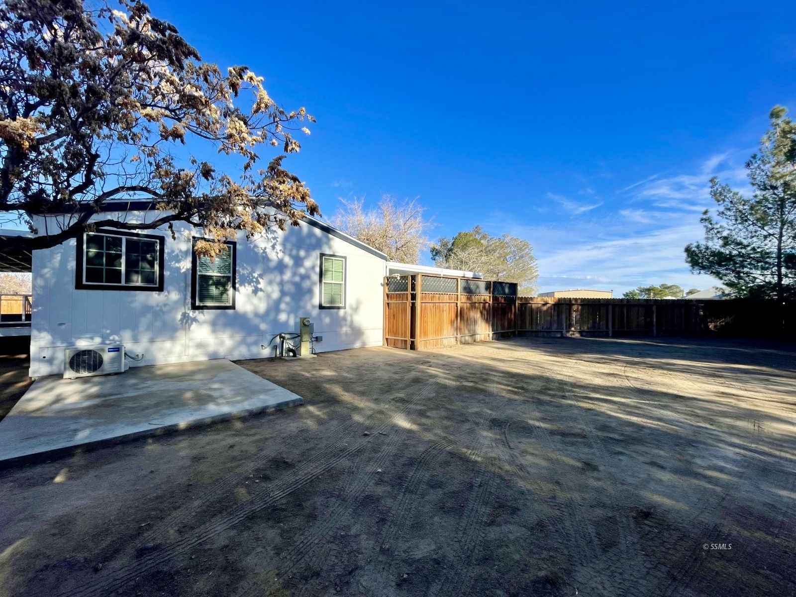1449 Dunes Street Ridgecrest, CA 93555 - Photo 49 of 50 a view of a house with a yard