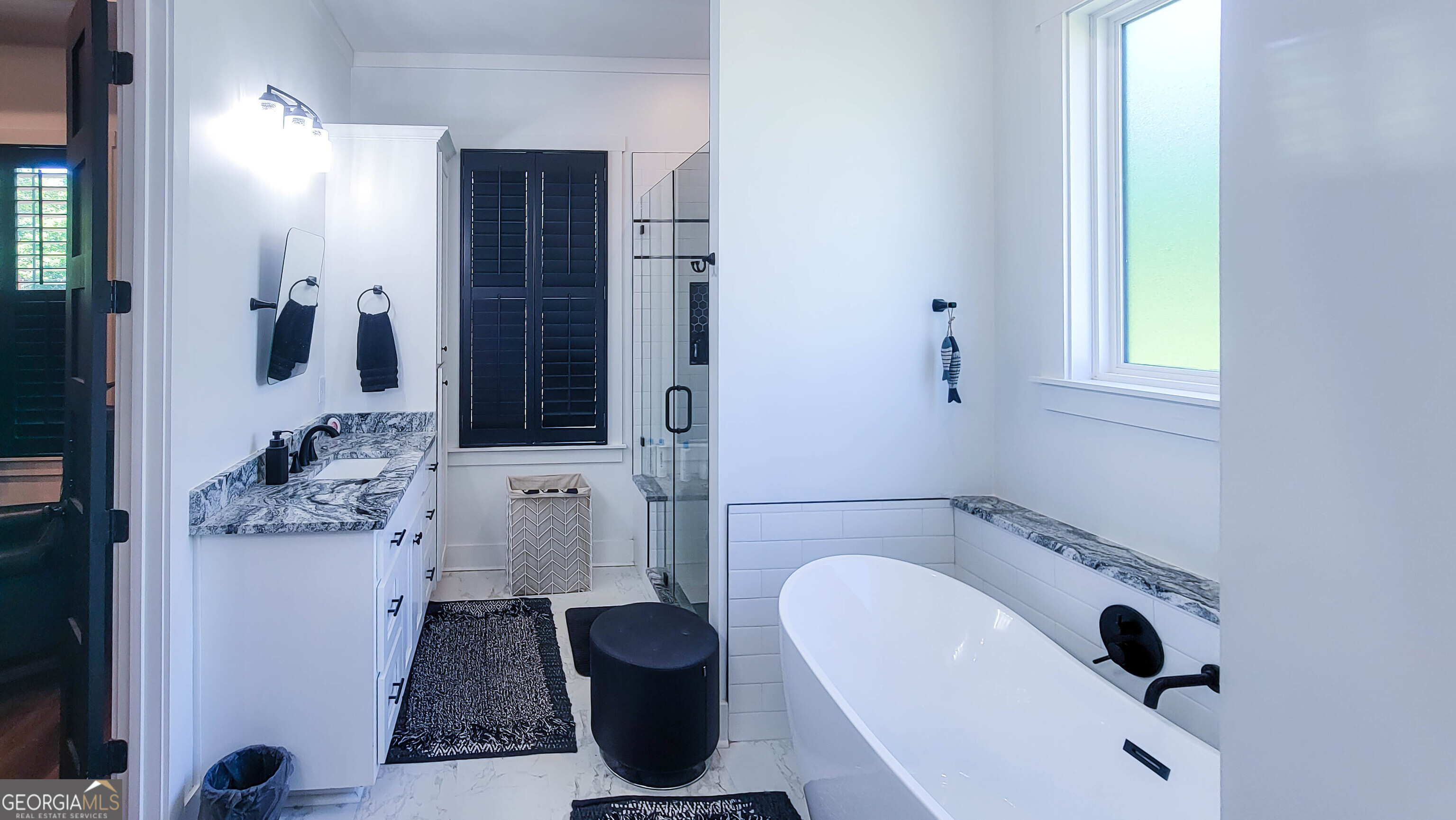 209 Lee Road Salem, AL 36874 - Photo 18 of 37 a bathroom with a bathtub and shower