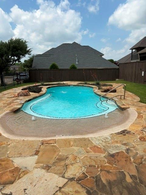 202 Tower Circle Terrell, TX 75160 - Photo 37 of 39 a view of swimming pool in the backyard of house