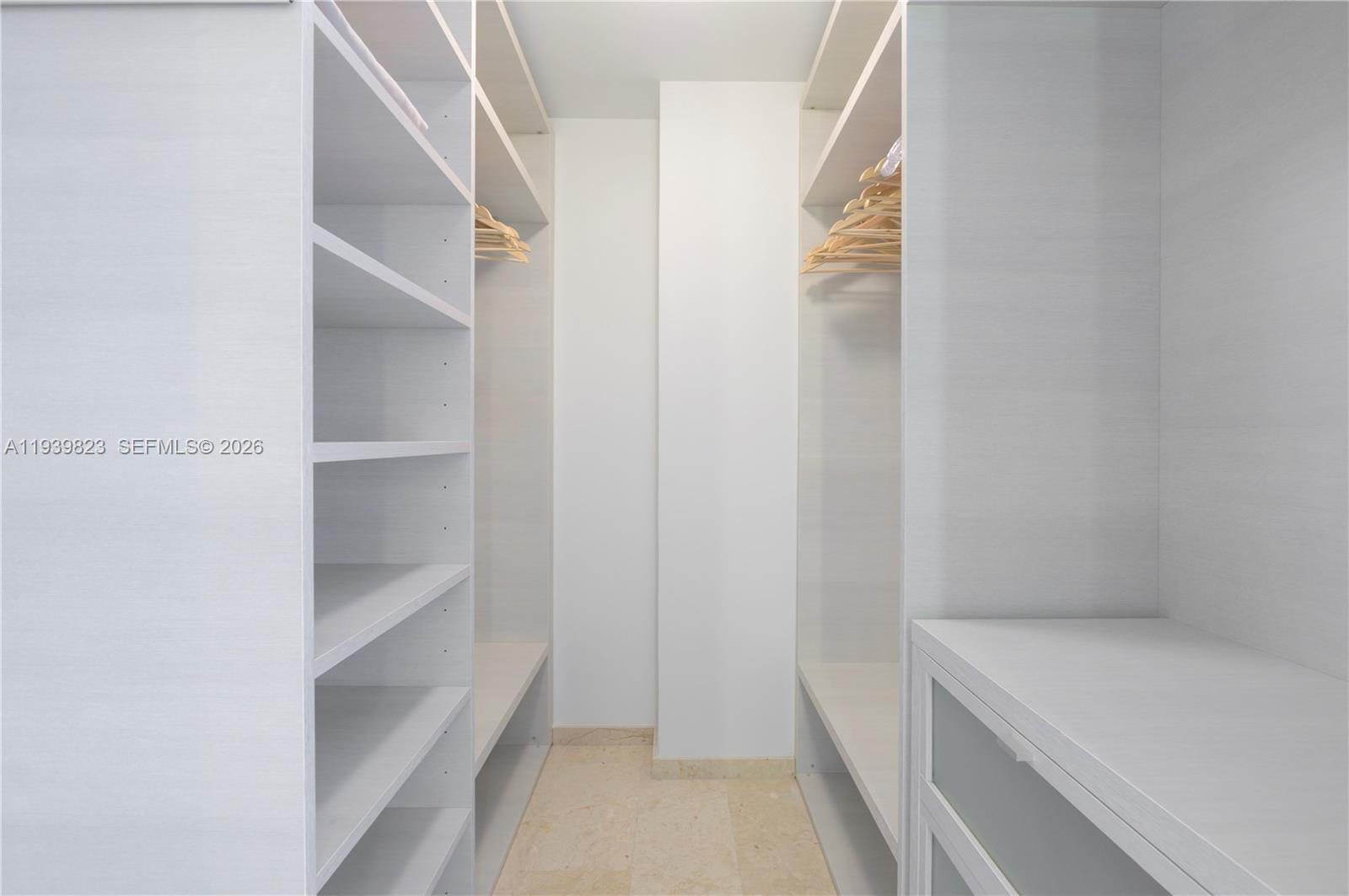 88 Southwest 7th Street, Unit 3405 Miami, FL 33130 - Photo 14 of 37 a view of an empty walk in closet