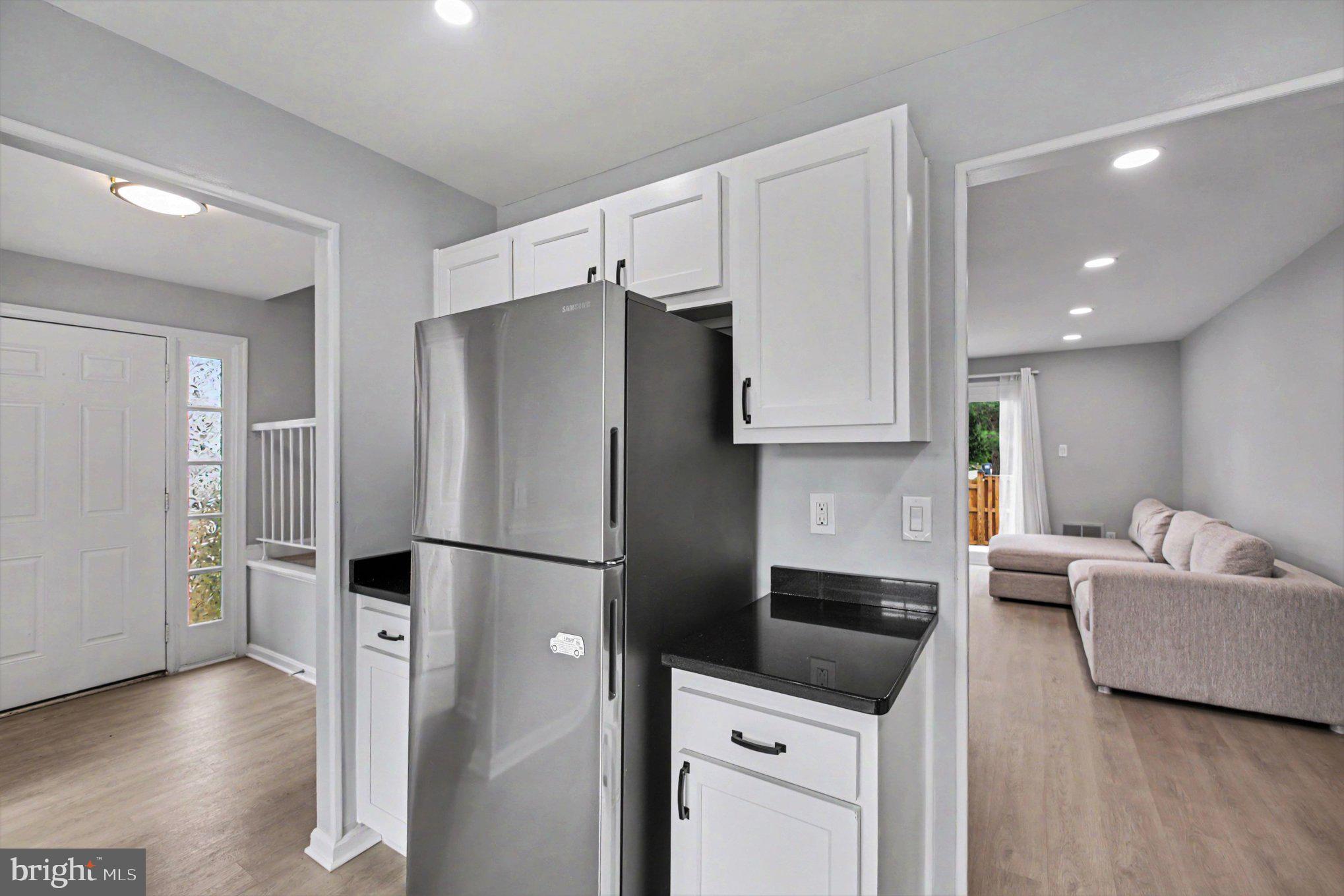 7981 Northumberland Road Springfield, VA 22153 - Photo 7 of 26 Modern kitchen with sleek finishes.