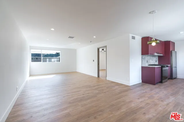 a view of kitchen and windows