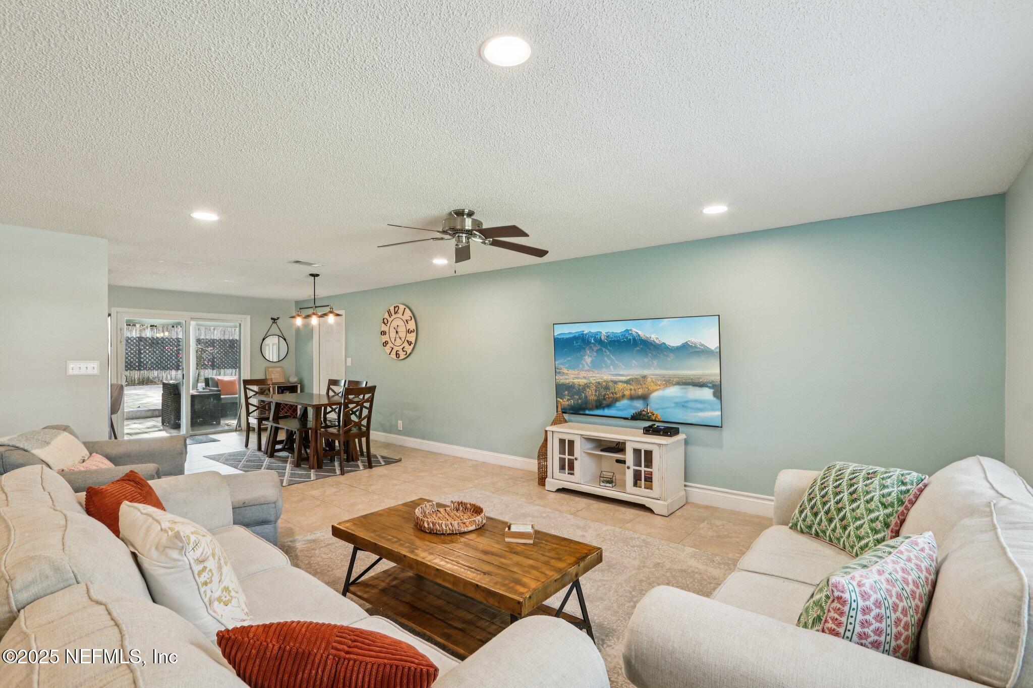 409 Seventeenth Street St. Augustine, FL 32084 - Photo 11 of 42 a living room with furniture and wooden floor