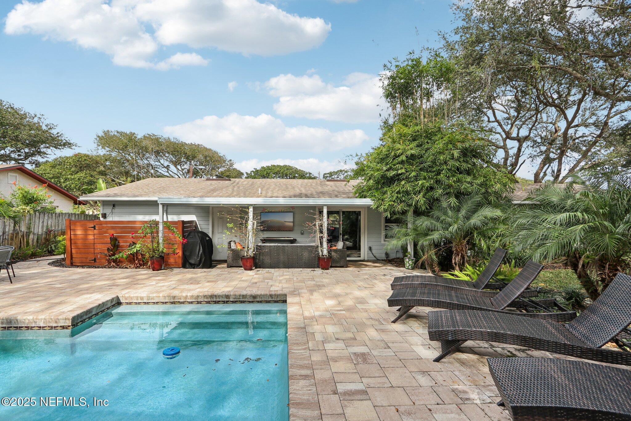 409 Seventeenth Street St. Augustine, FL 32084 - Photo 40 of 42 a view of a house with backyard porch and sitting area